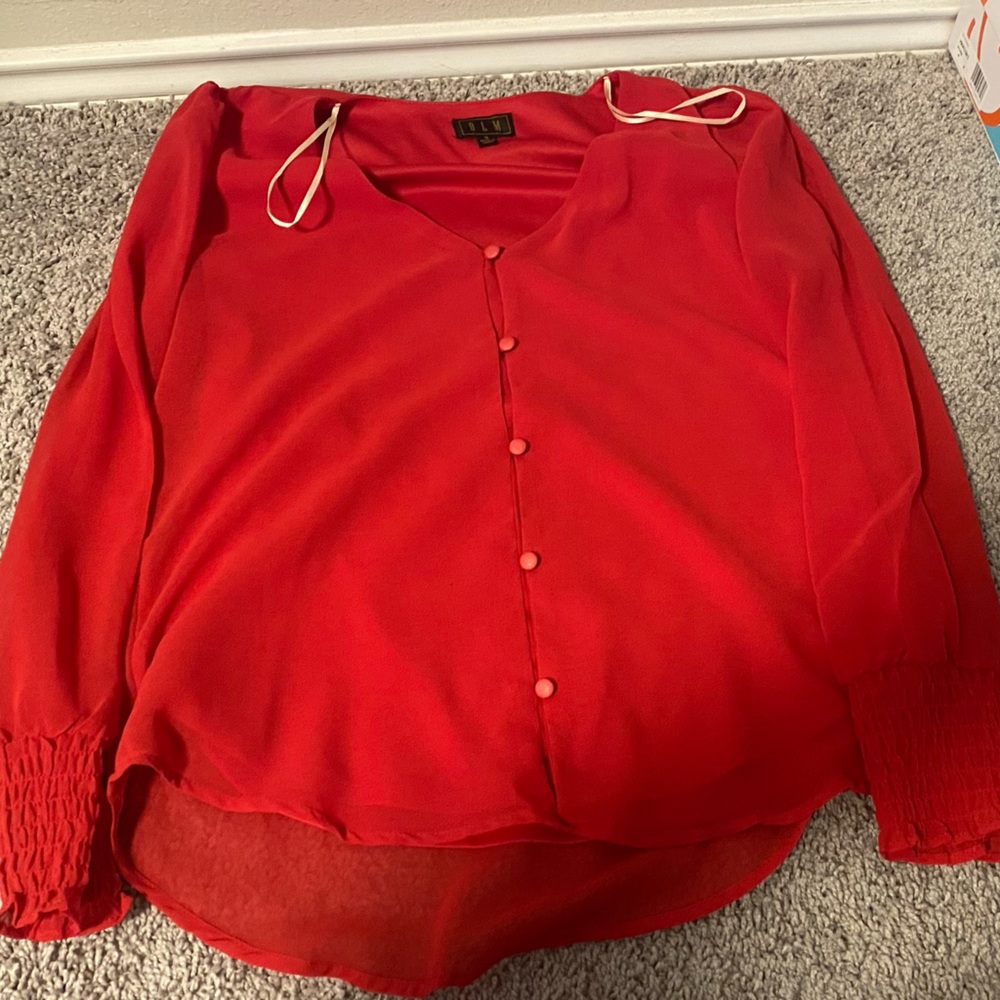 Three cute blouses, all small. 25$ for all 3